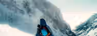 Scaling Heights: Path to Leadership Mastery Climber faces towering snowy peaks, symbolizing the emerging leader navigating challenges on the path to self-improvement.