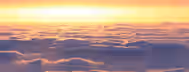 Rising Above the Clouds: A Leader's Dawn Sunrise above the clouds symbolizing a leader's ascent towards clarity and self-improvement, breaking through barriers to new horizons.