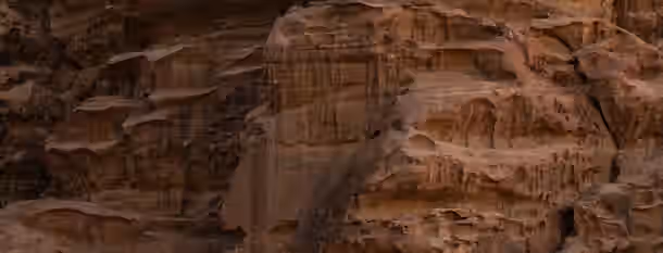 Scaling the Rocky Path to Leadership A rugged cliff symbolizes the challenging but rewarding ascent of an emerging leader on the path to self-improvement and growth.