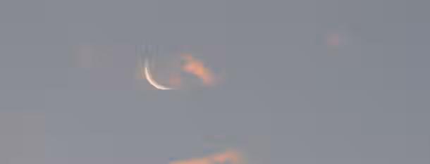 Dawn of Leadership: Embracing New Beginnings A crescent moon gradually illuminates the sky, symbolizing the emergence and growth on the journey to self-improvement.