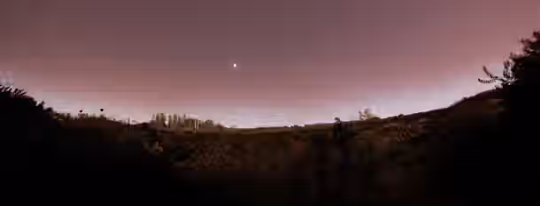 Rising Star in the Twilight of Self-Discovery A lone star shines brightly above a dark, serene landscape, symbolizing the solitary but determined path of an emerging leader towards self-improvement.