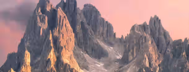 Climbing the Peaks of Leadership A towering mountain under a pink sky symbolizes the challenging yet beautiful ascent towards leadership and self-improvement.