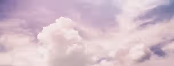 Ascending Through Clouds of Growth Billowing clouds against a serene sky, symbolizing an emerging leader's journey towards clarity and self-improvement.