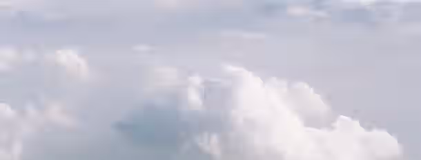 Ascending Through Clouds of Growth Clouds parting to reveal a bright sky, symbolizing an emerging leader's journey from obscurity to enlightenment and growth.